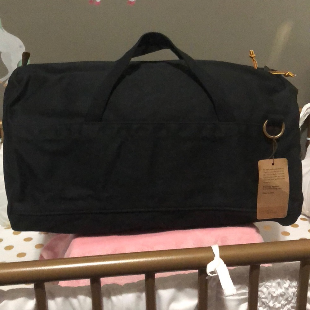 Black waxed duffel